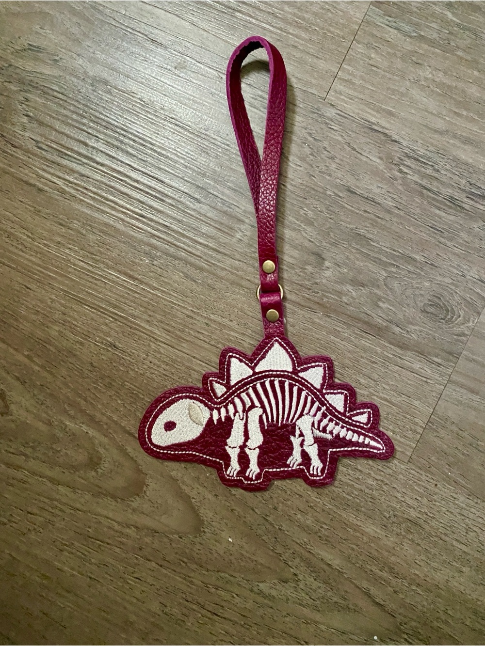 PLG NWT Colorado store flair Dinosaur Skeleton Wristlet Bag Charm